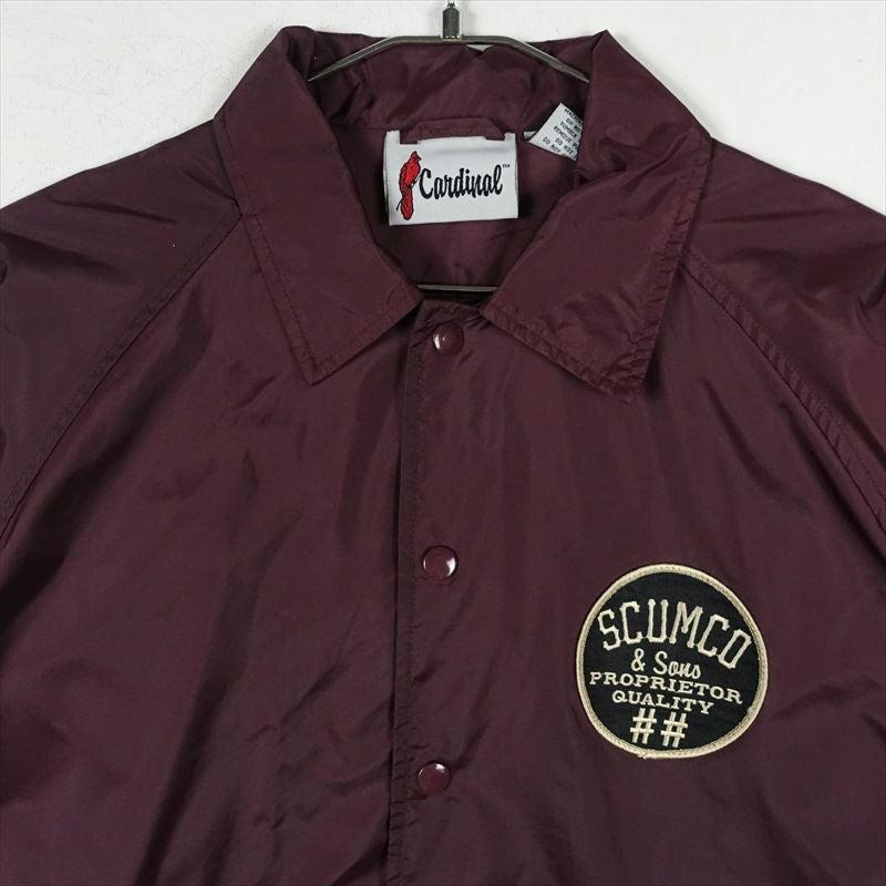 Cardinal ナイロンコーチジャケット 古着　バックプリント　黒　ブラック 古着 Cardinal バックプリント コーチジャケット | Flamingo Online