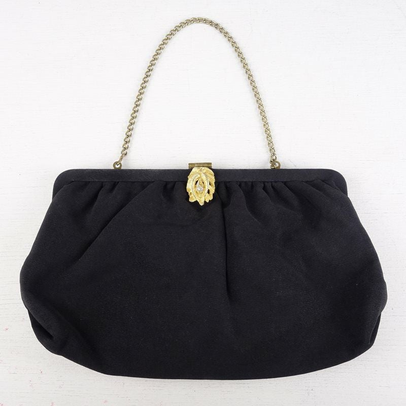 古着のがま口型パーティーバッグ