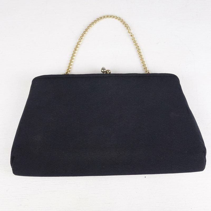 古着のがま口ハンドポーチ