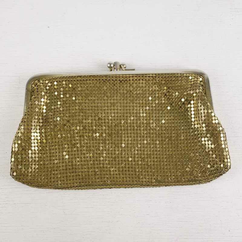 古着のがま口仕切りポーチ